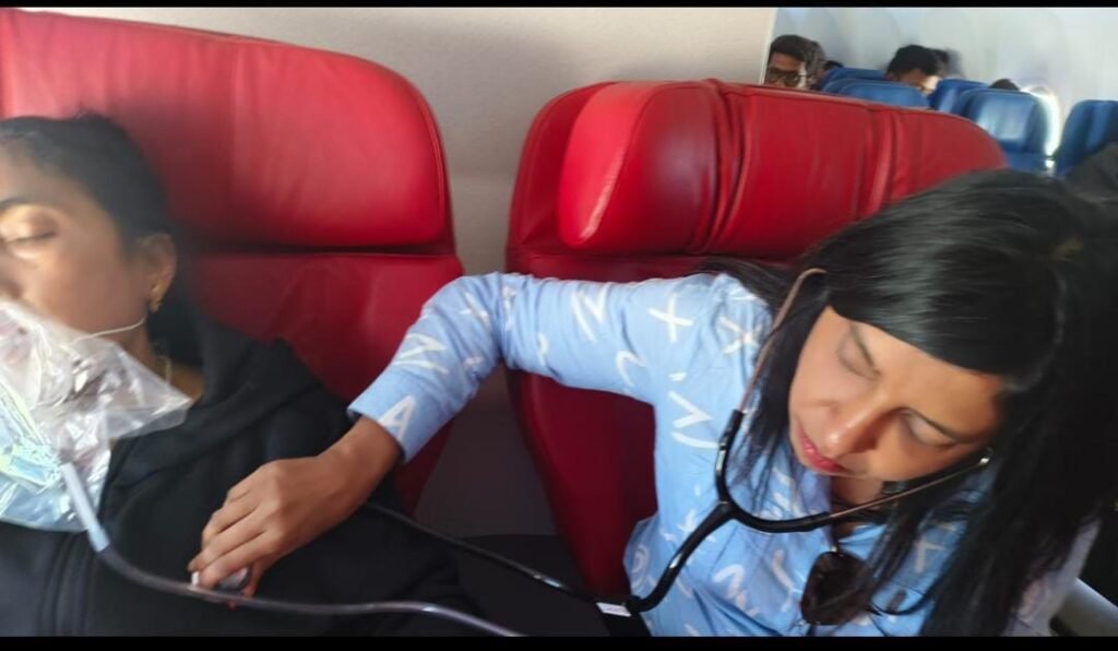 Dr. Pratima Raj provides emergency treatment to the air passenger