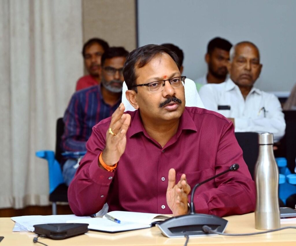 What happened behind the transfer of the District Collector?