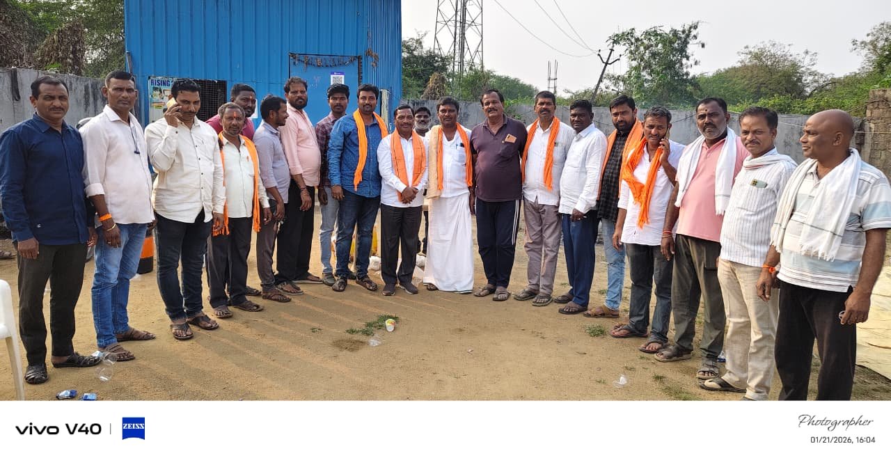 Milk and biscuits distributed to devotees going on a padayatra to Basara