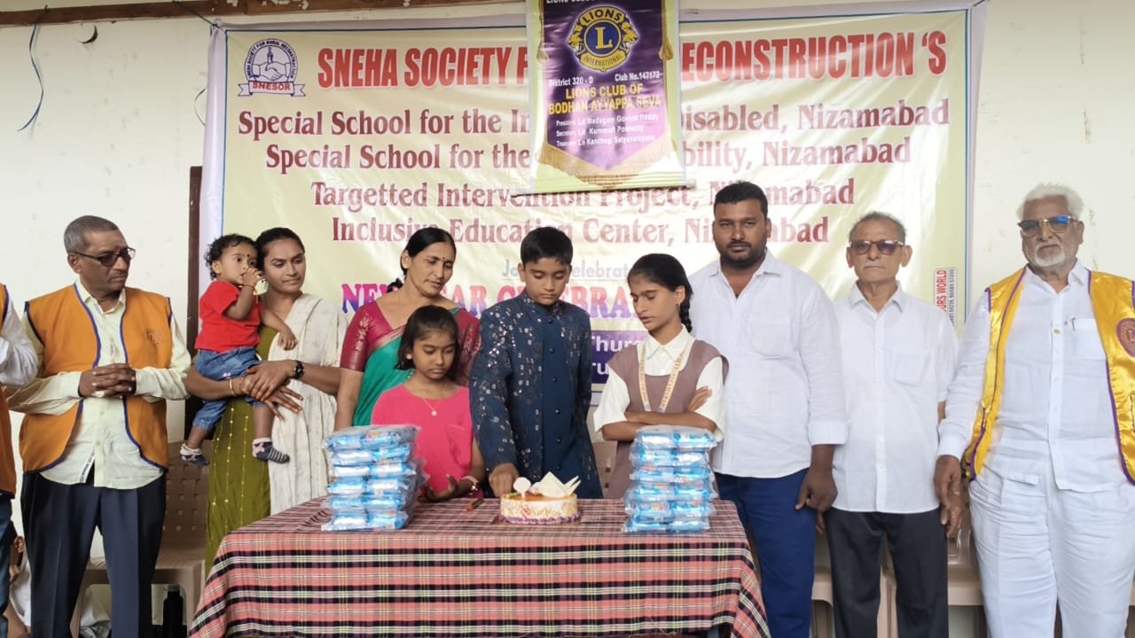 Food distribution to mentally challenged students at Sneha Society
