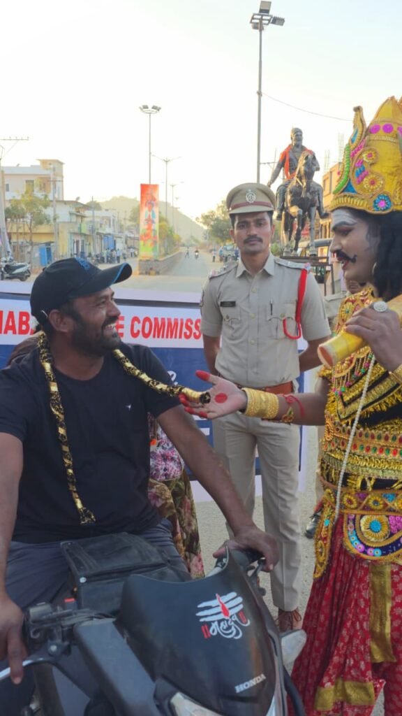యముడి వేషాధారణలో వాహనదారులకు అవగాహన