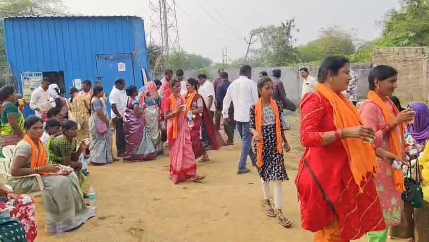 Milk and biscuits distributed to devotees going on a padayatra to Basara