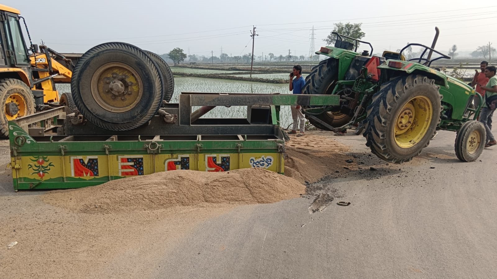 Sand tractor overturned