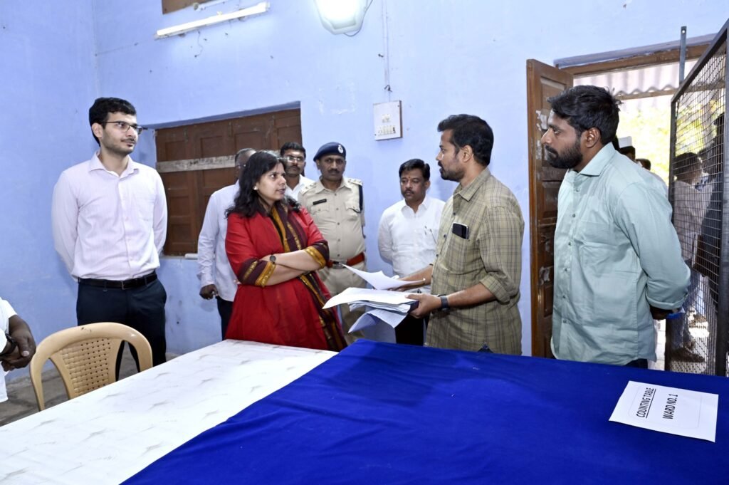 Collector visits distribution center and polling stations
