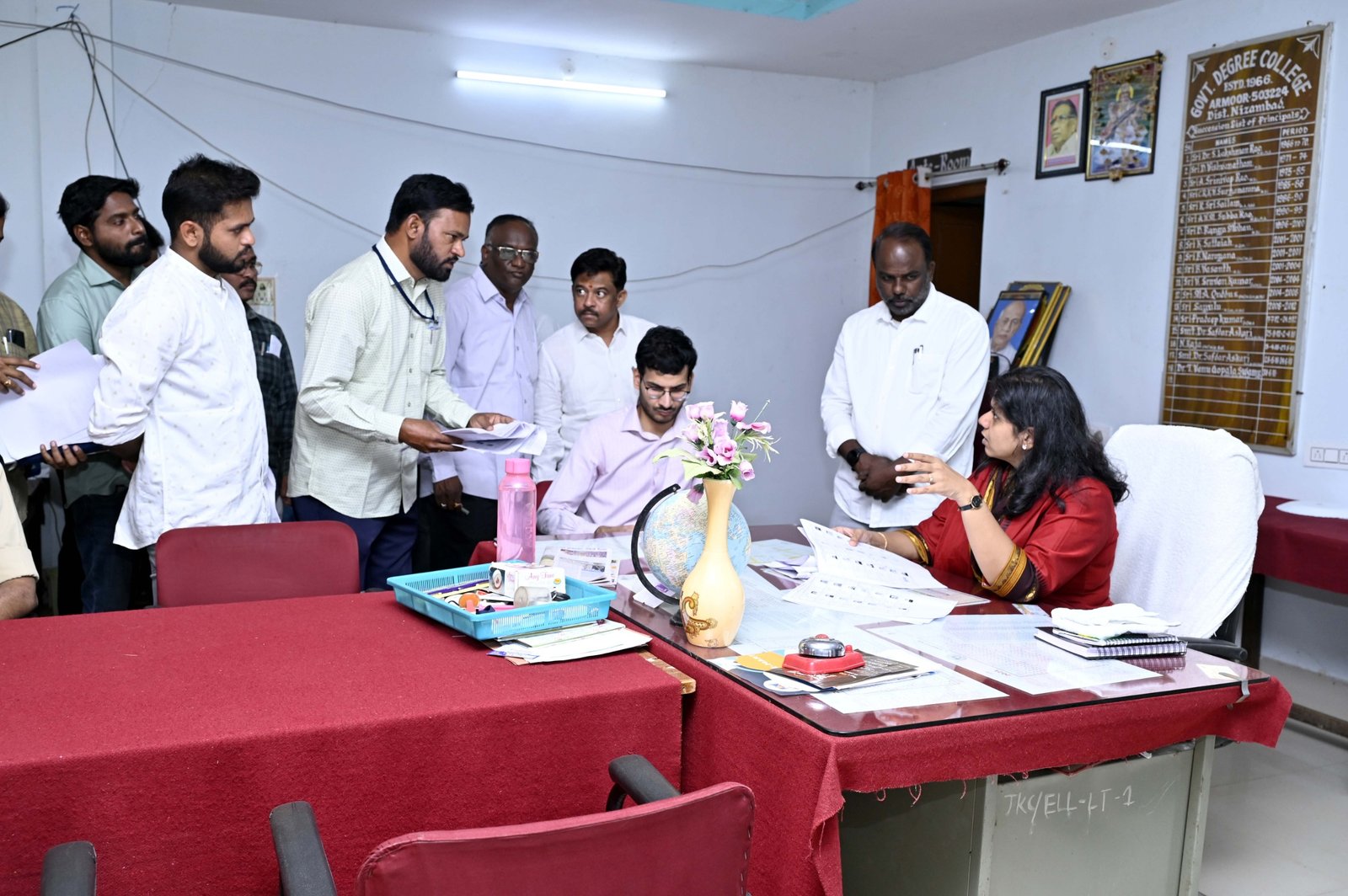 Collector visits distribution center and polling stations