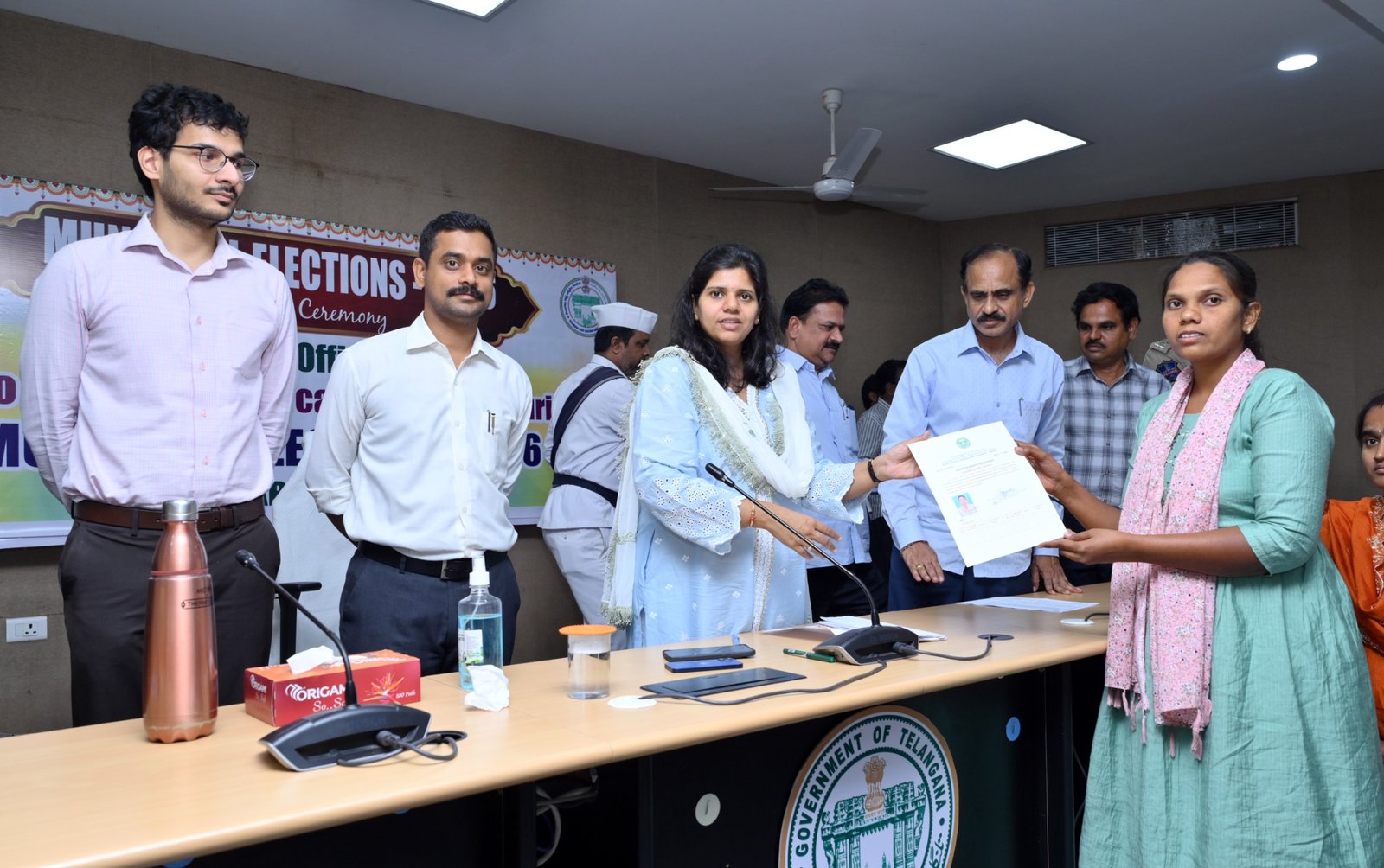 Collector presents certificates to licensed surveyors
