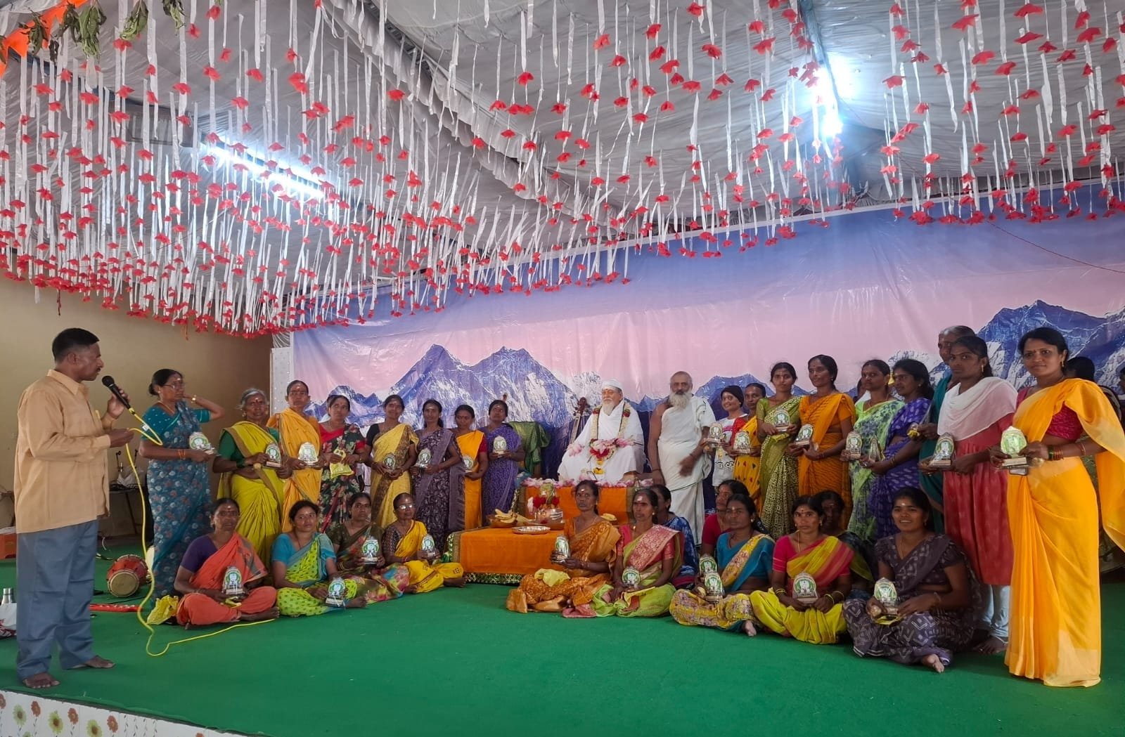 Paddy transplantation with devotees in Sitarampalle