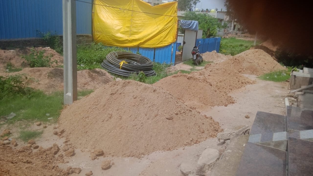 Construction of a gravel road between the SBI bank and the society office in Jukkal.