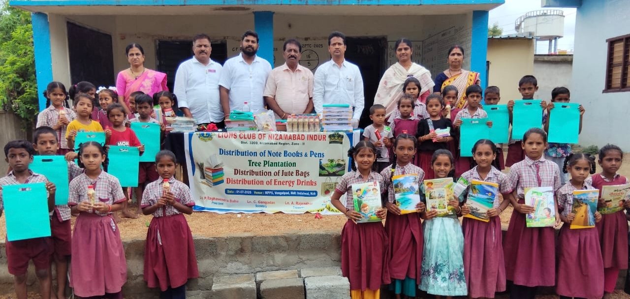 Distribution of books and jute bags to students.