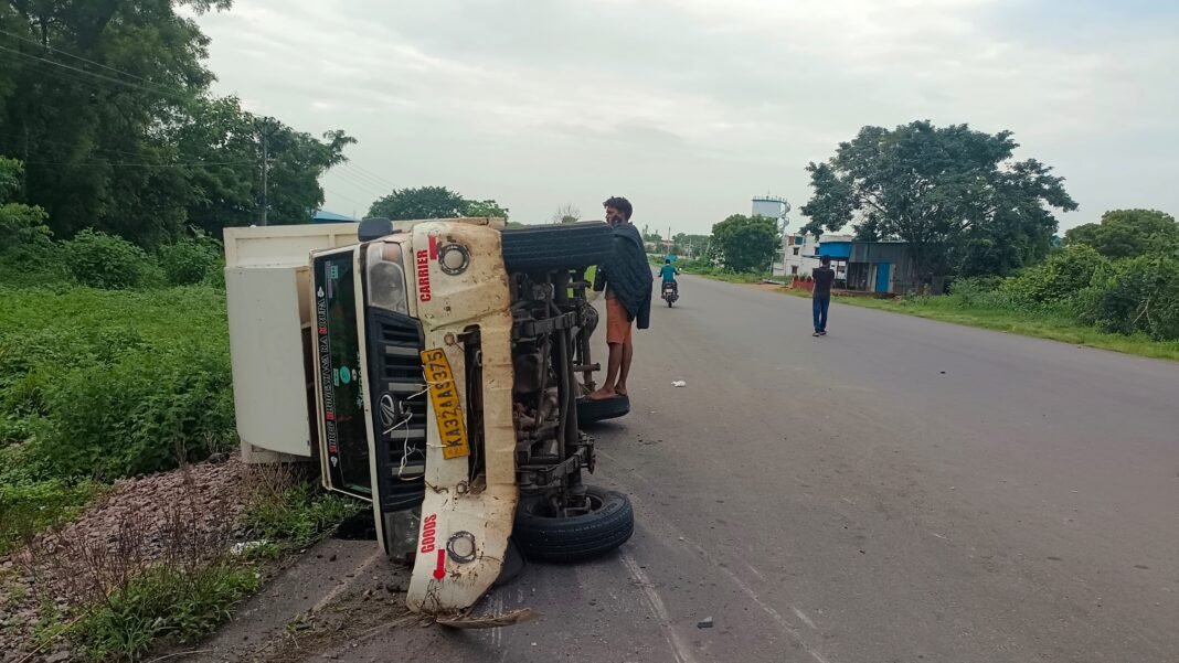 Courier vehicle overturns