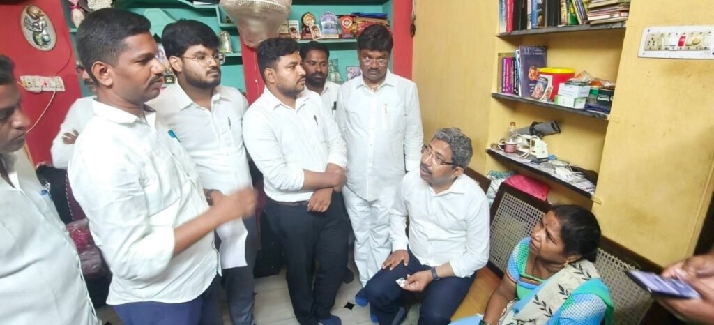 Senior Counsel V. Raghunath consoles Bogini Mallayya's family.