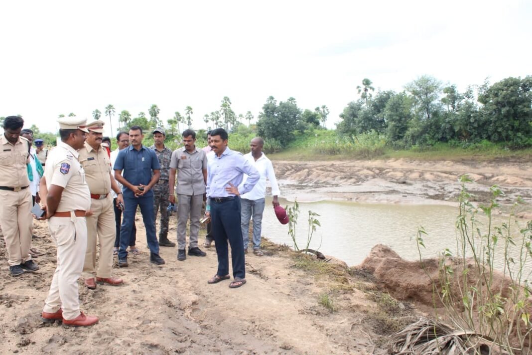 CP inspects the site where the tank bund breached.
