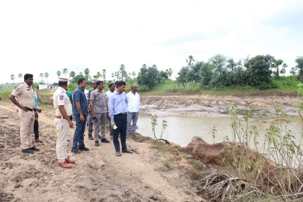 CP inspects the site where the tank bund breached.