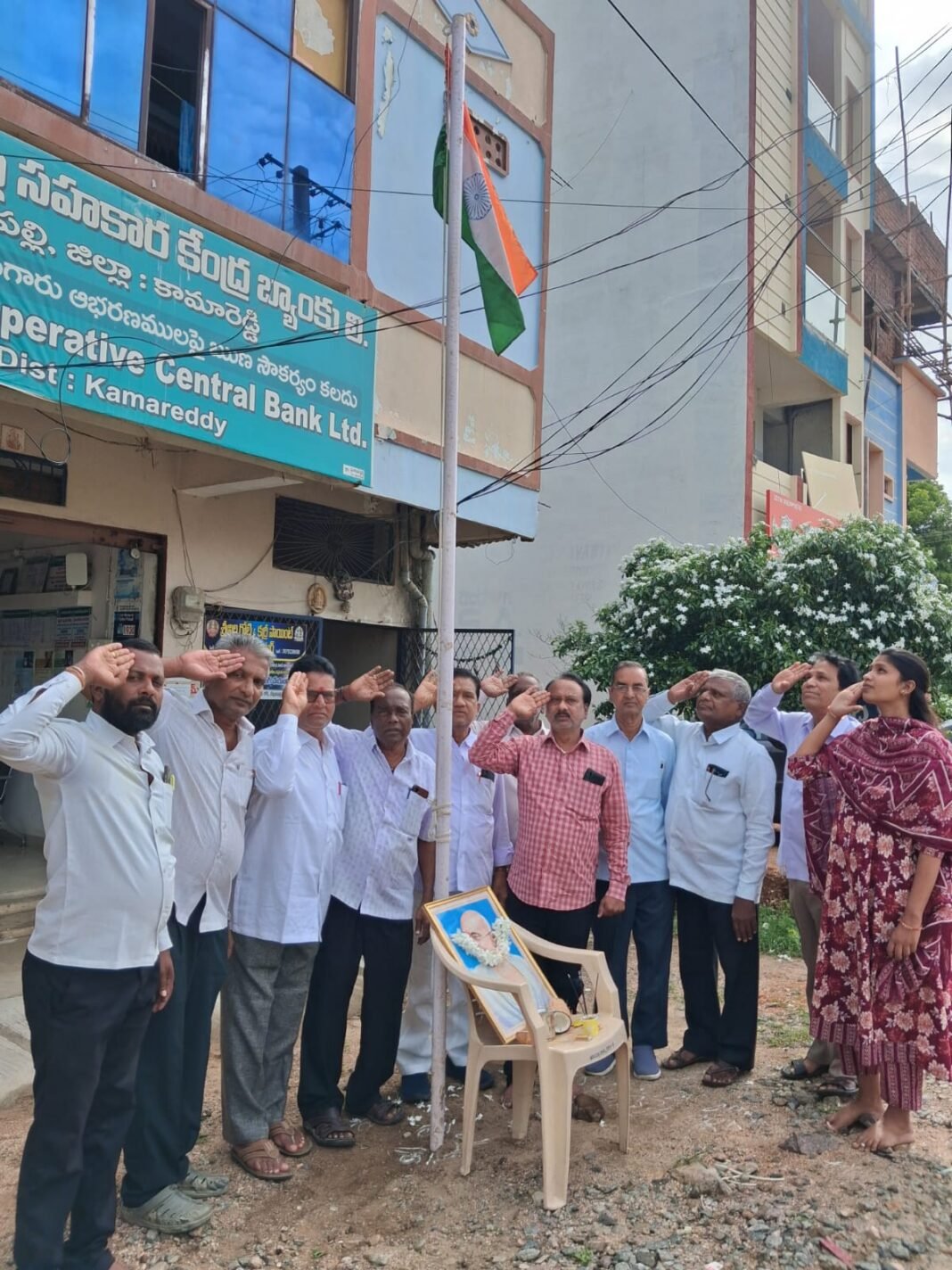 Bank Manager Kotturi Prashanth hoisted the national flag at the Kamareddy Cooperative Central Bank.