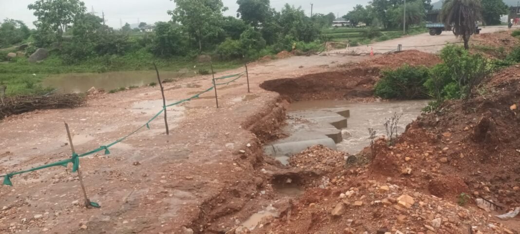 Bridge worth one crore rupees washed away by rains.