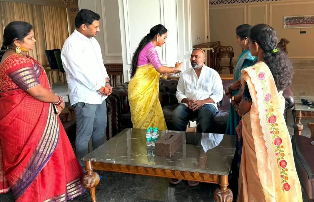 Women tied Rakhis to MP Arvind.