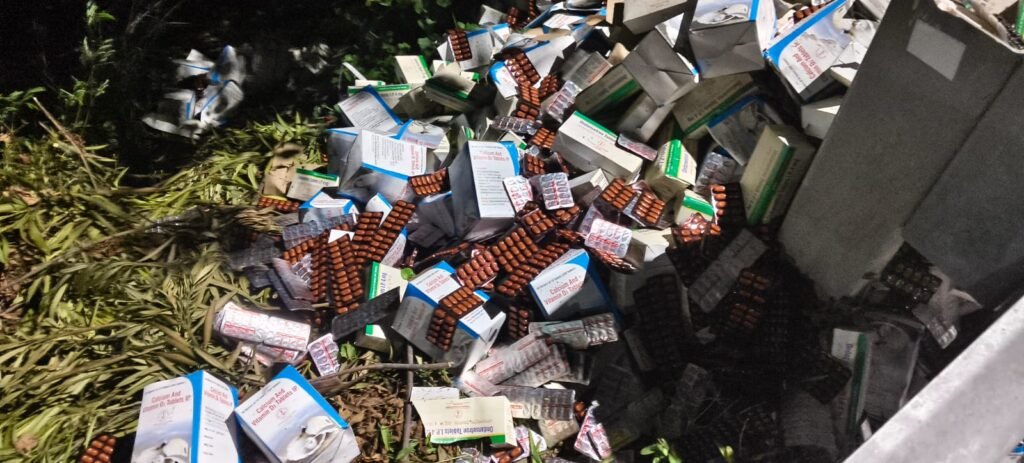 Piles of government medicines by the roadside.