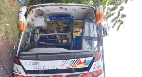 Travels bus overturns on Ananthagiri Ghat Road